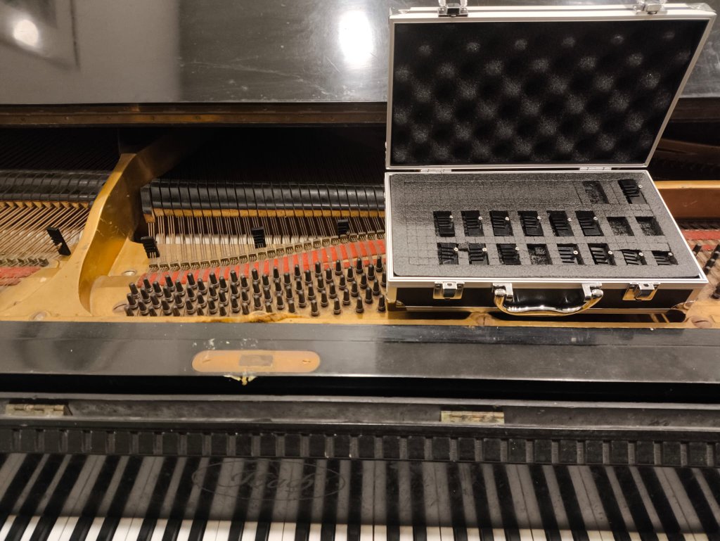 Grand piano with adapters